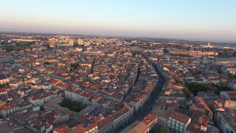 Aerial-sunset-over-Montpellier-city.-Old-mediterranean-town-drone-shot